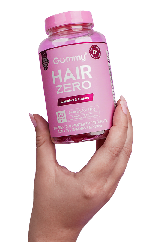 Mão segurando um Gummy Hair ZERO